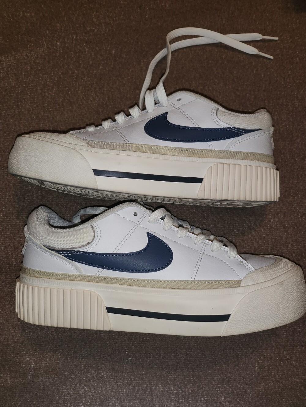 Nike Women’s White Sneakers with Navy Swoosh and Cream Accents